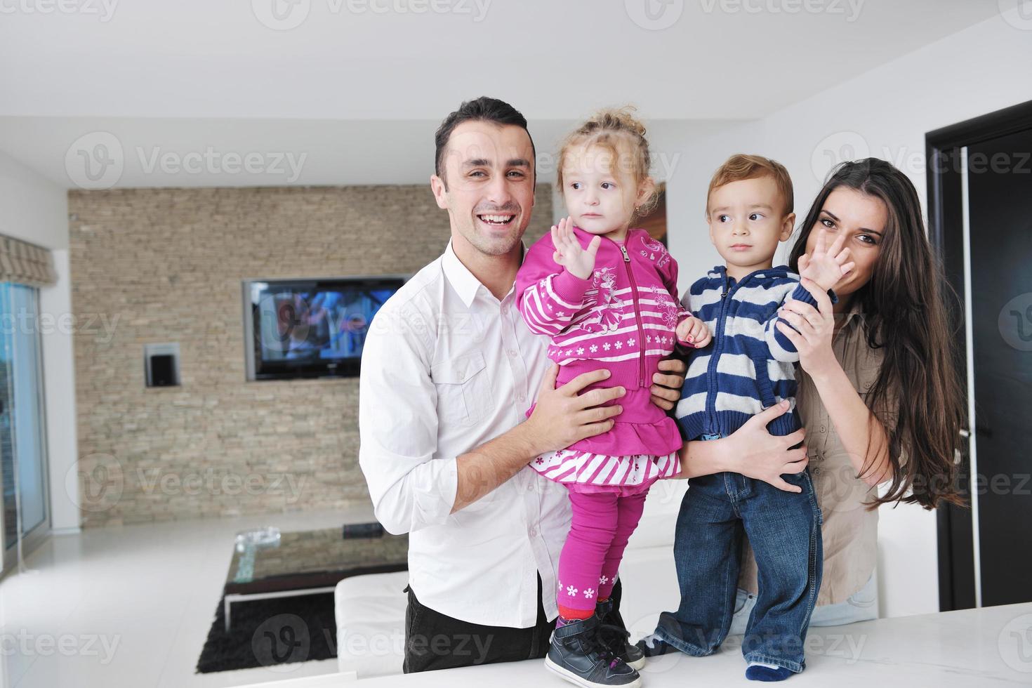 happy young family have fun  at home photo