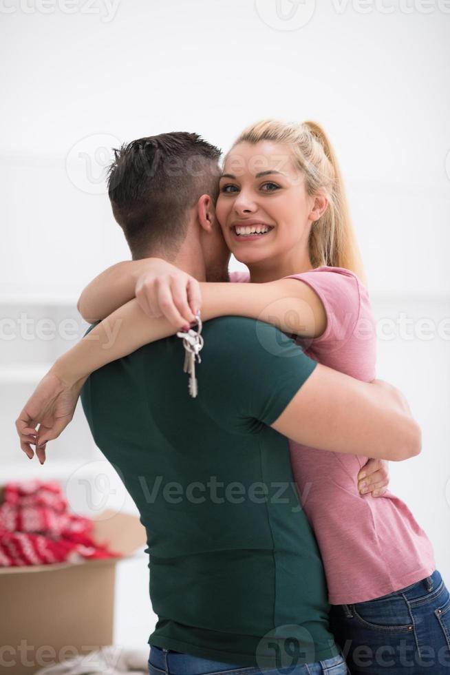 happy Young couple moving in new house photo