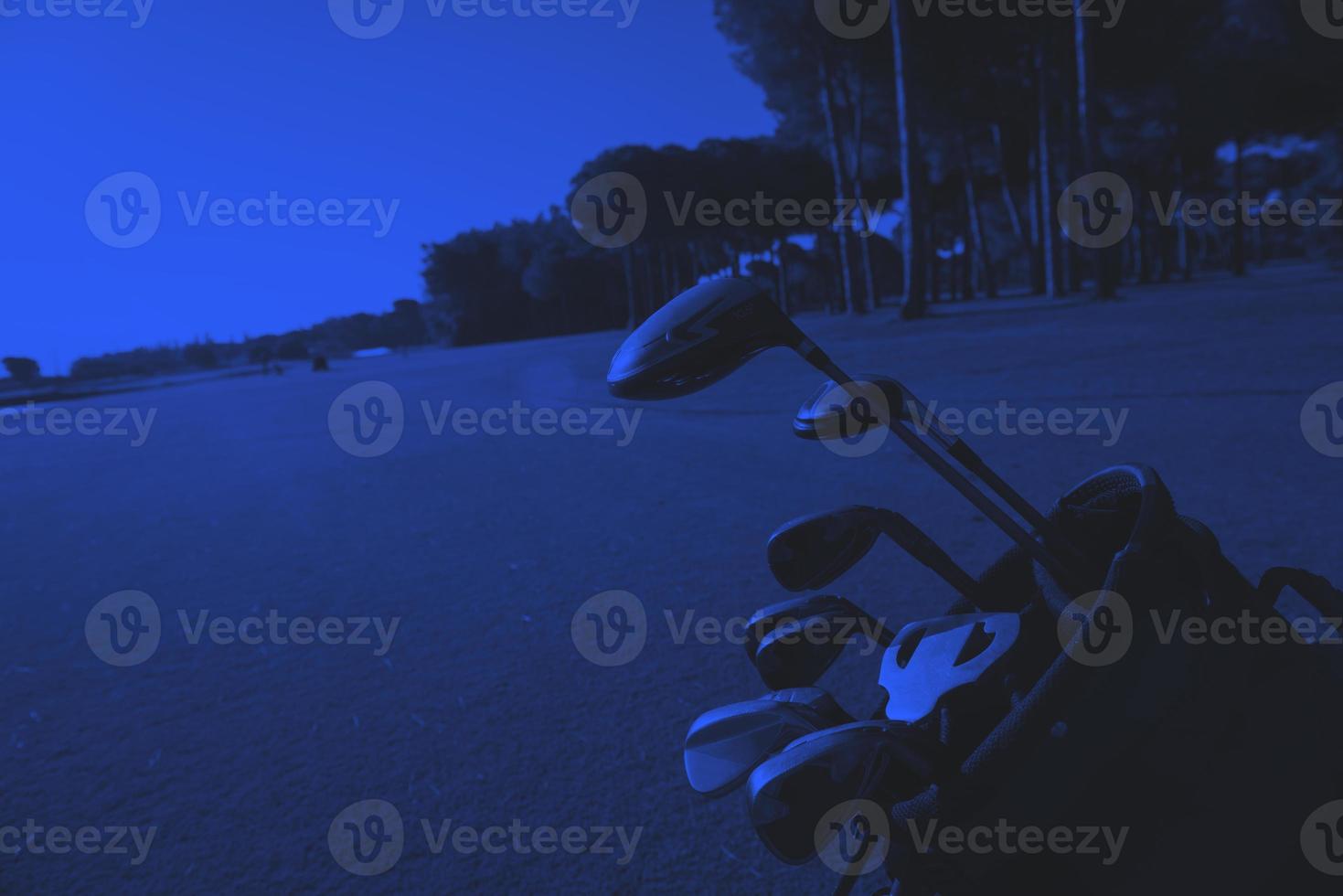 close up golf bag on course photo