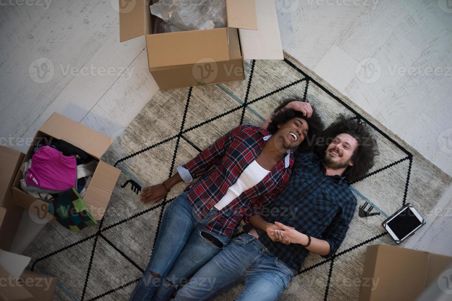 Top view of attractive young multiethnic couple photo