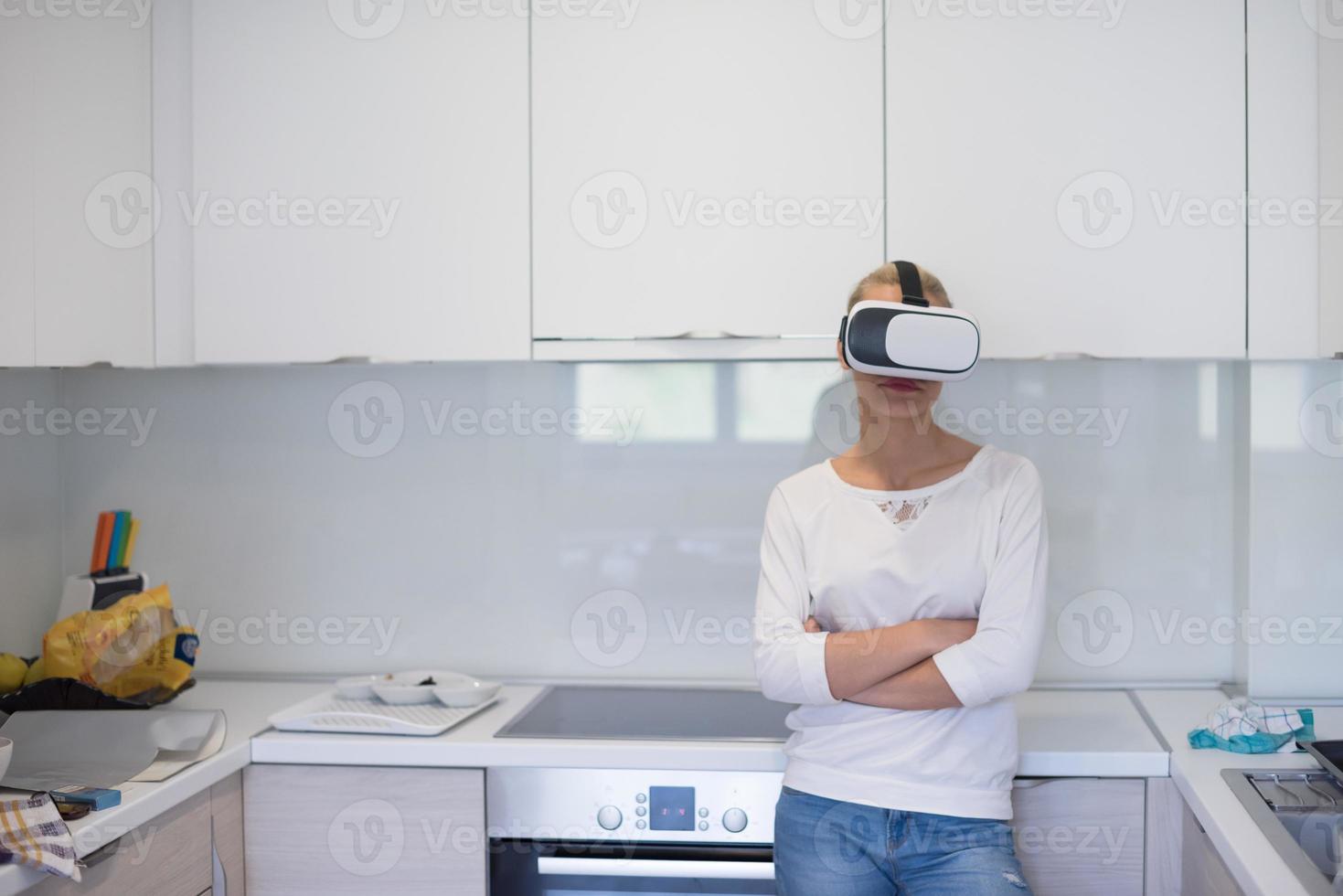 woman using VR-headset glasses of virtual reality photo