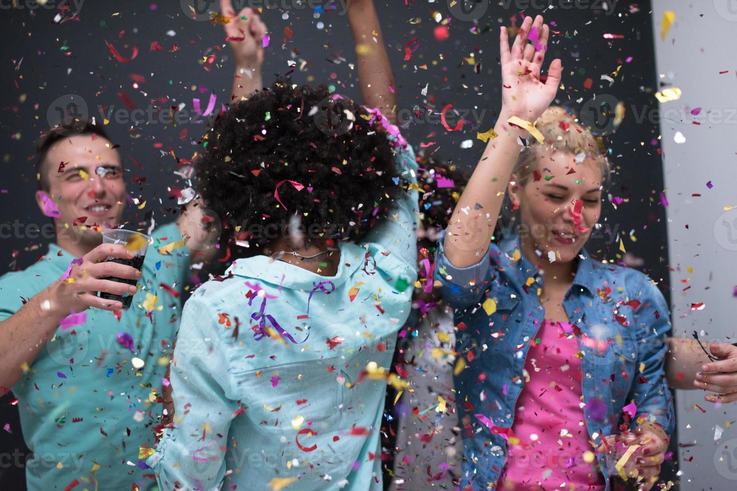 confetti party multiethnic group of people photo