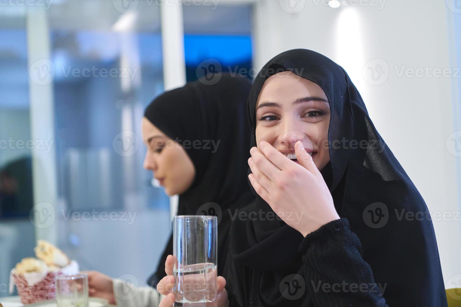 Muslim family having iftar together during Ramadan photo