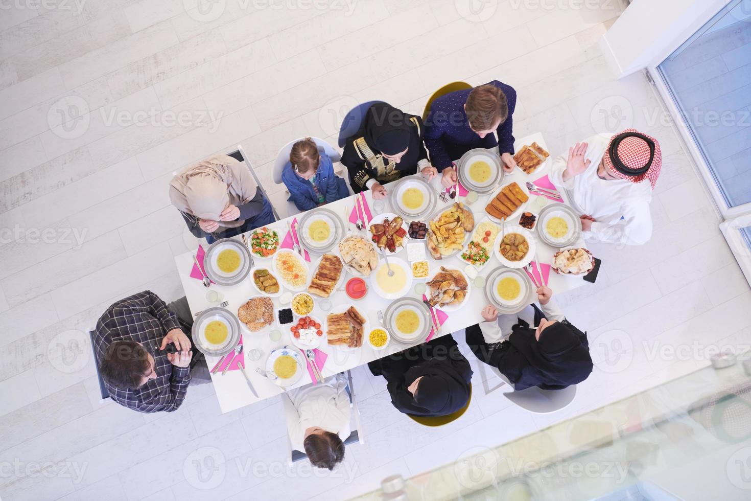 muslim family having a Ramadan feast top view photo