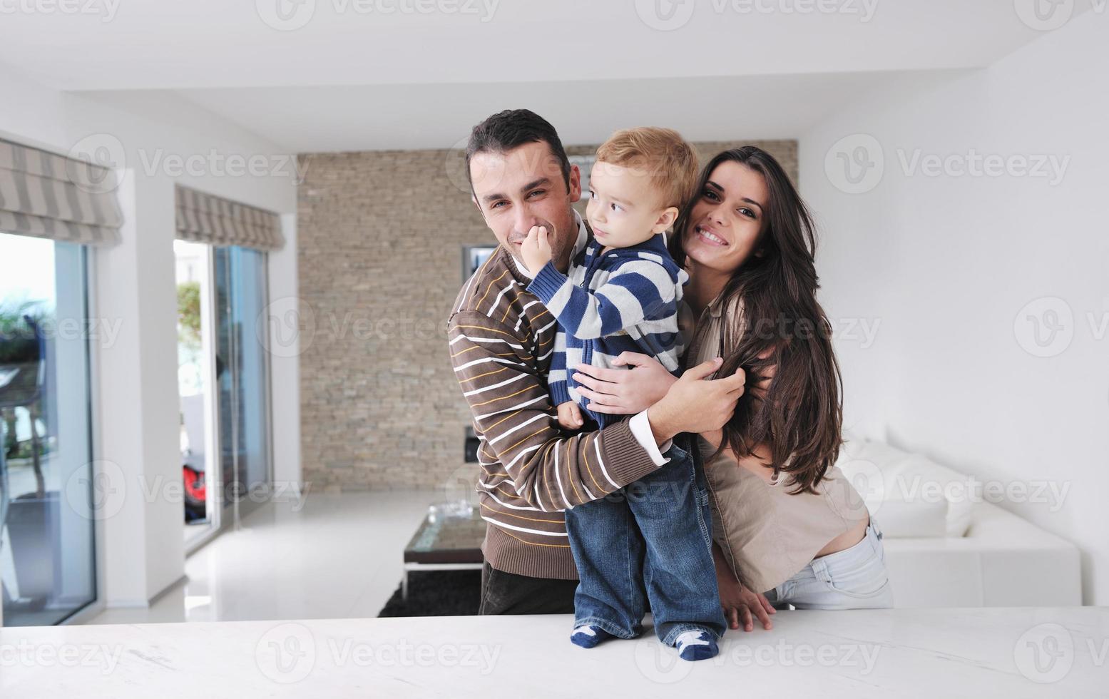 happy young family have fun  at home photo