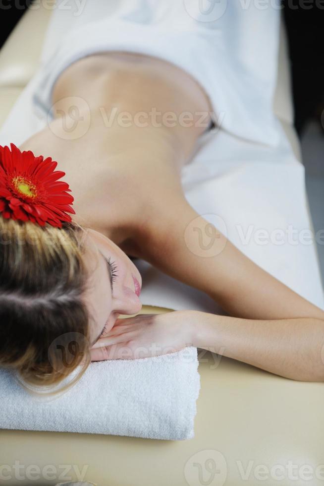 Beautiful young woman in spa photo