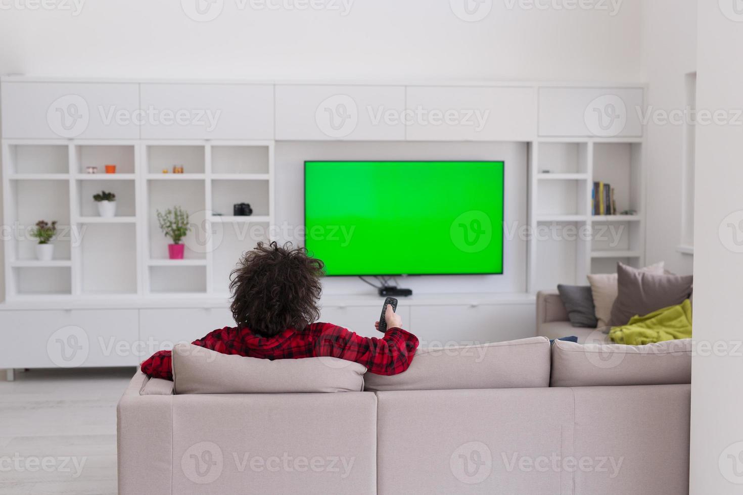 young man in bathrobe enjoying free time photo