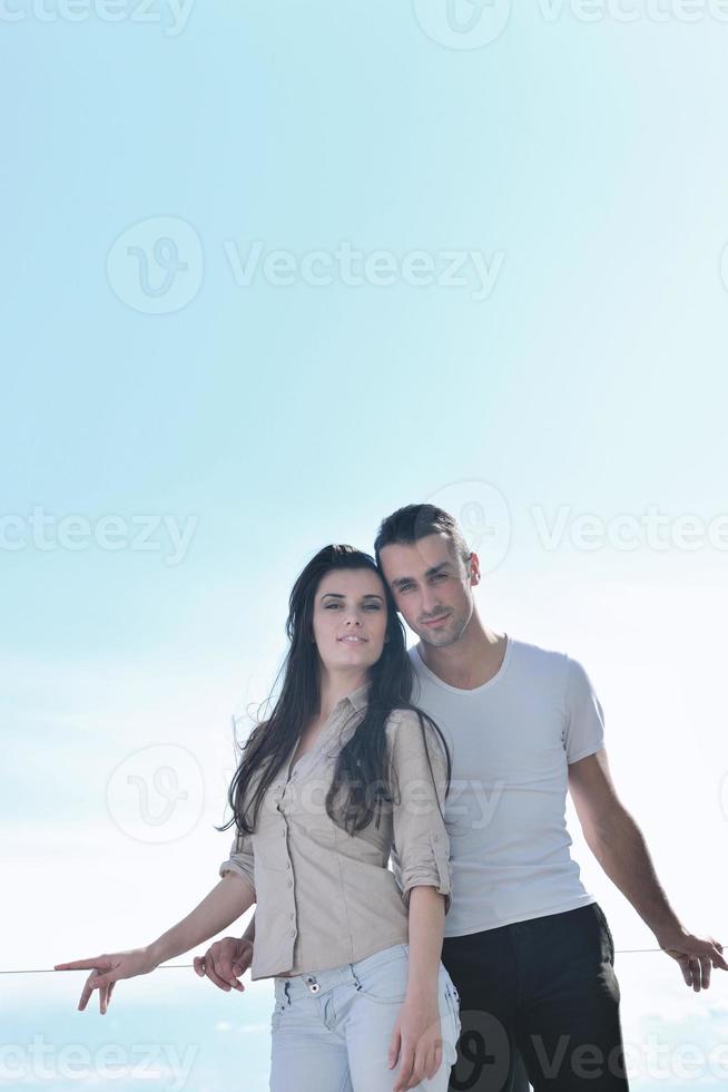 couple relaxing on balcony photo