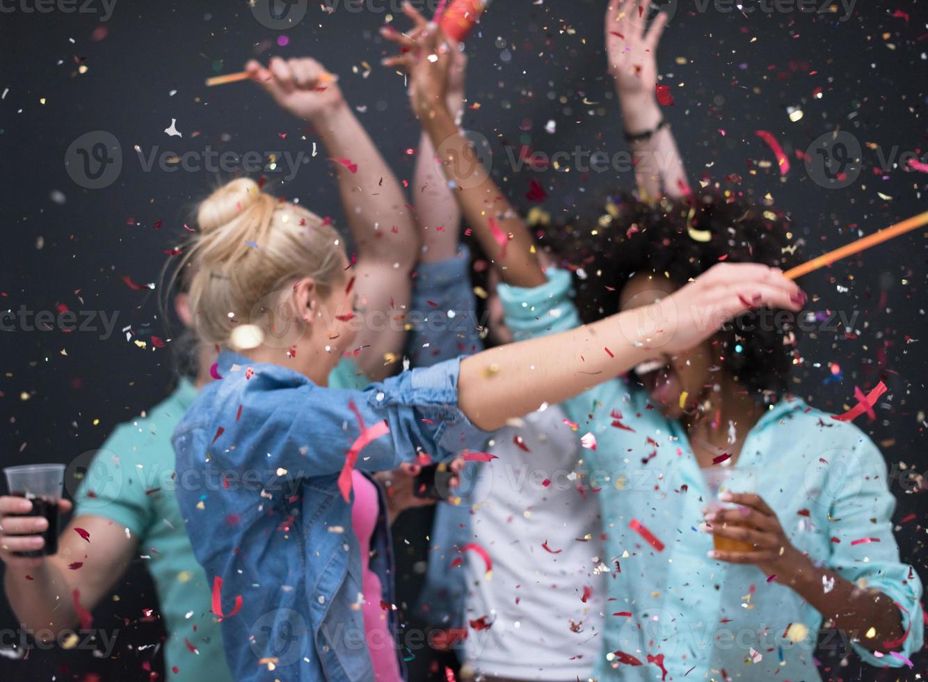 confetti party multiethnic group of people photo