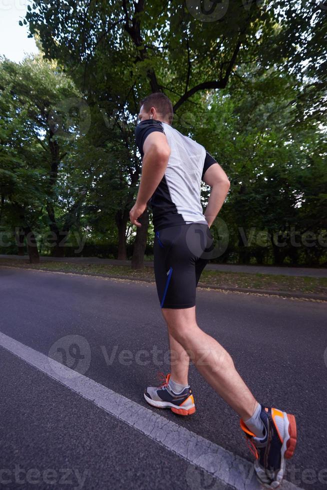 man jogging outside photo