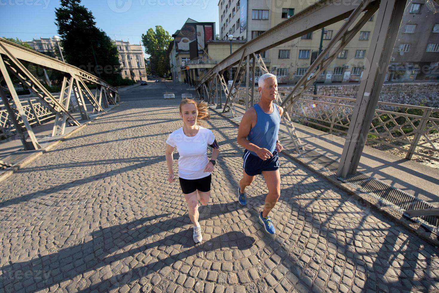 Couple jogging outside photo