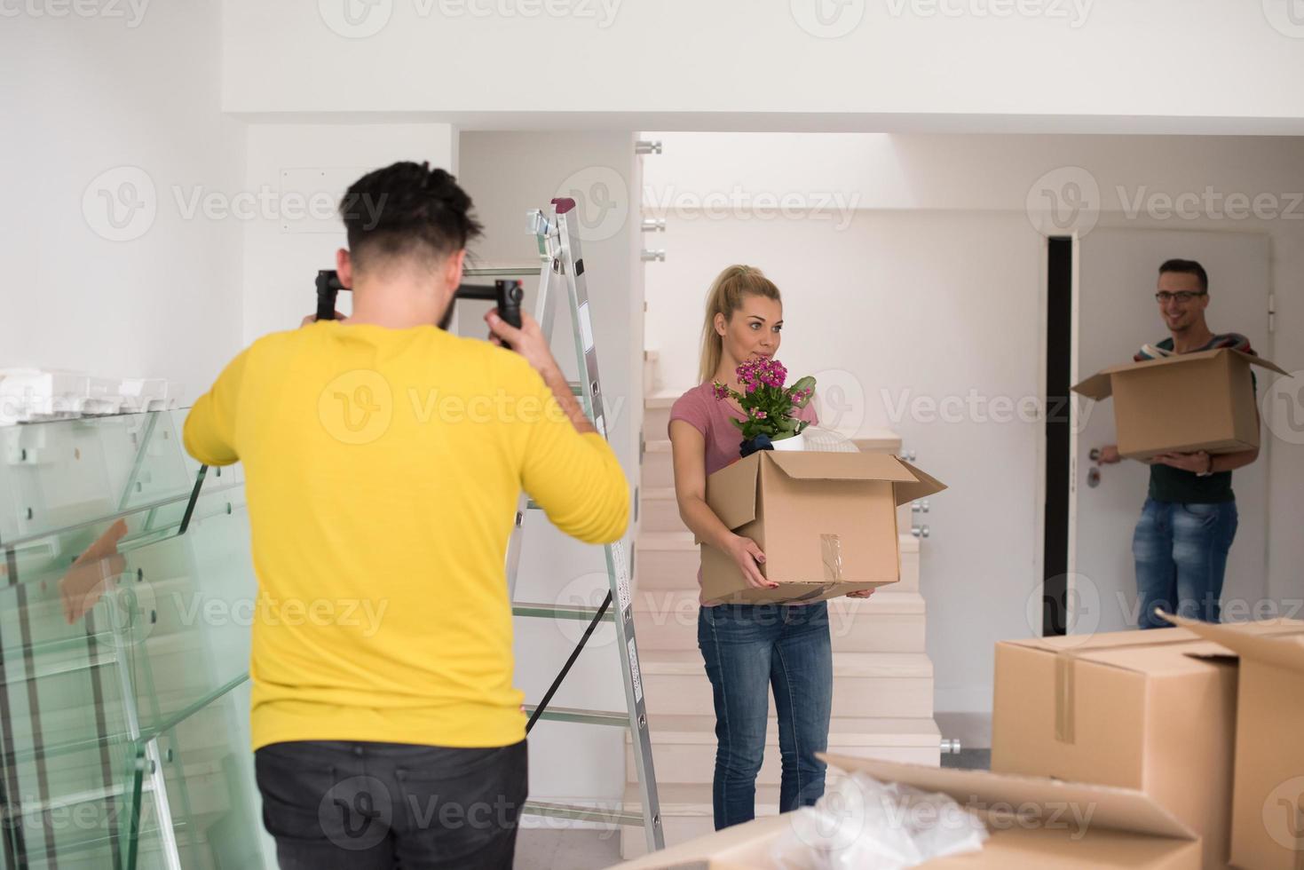 young couple moving into a new home photo