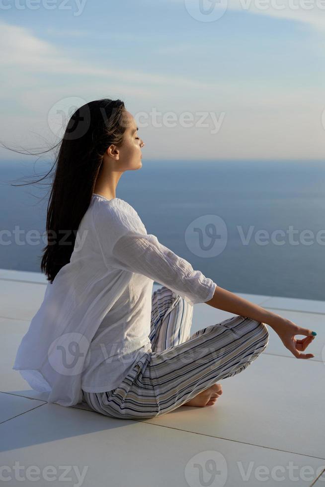 young woman practice yoga photo