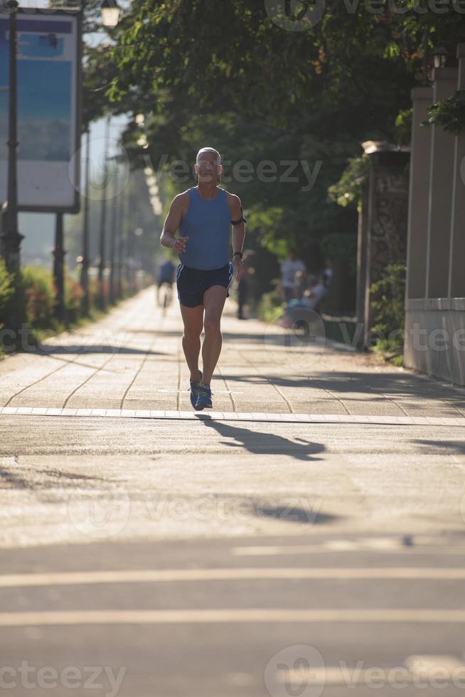 handsome senior man  jogging photo
