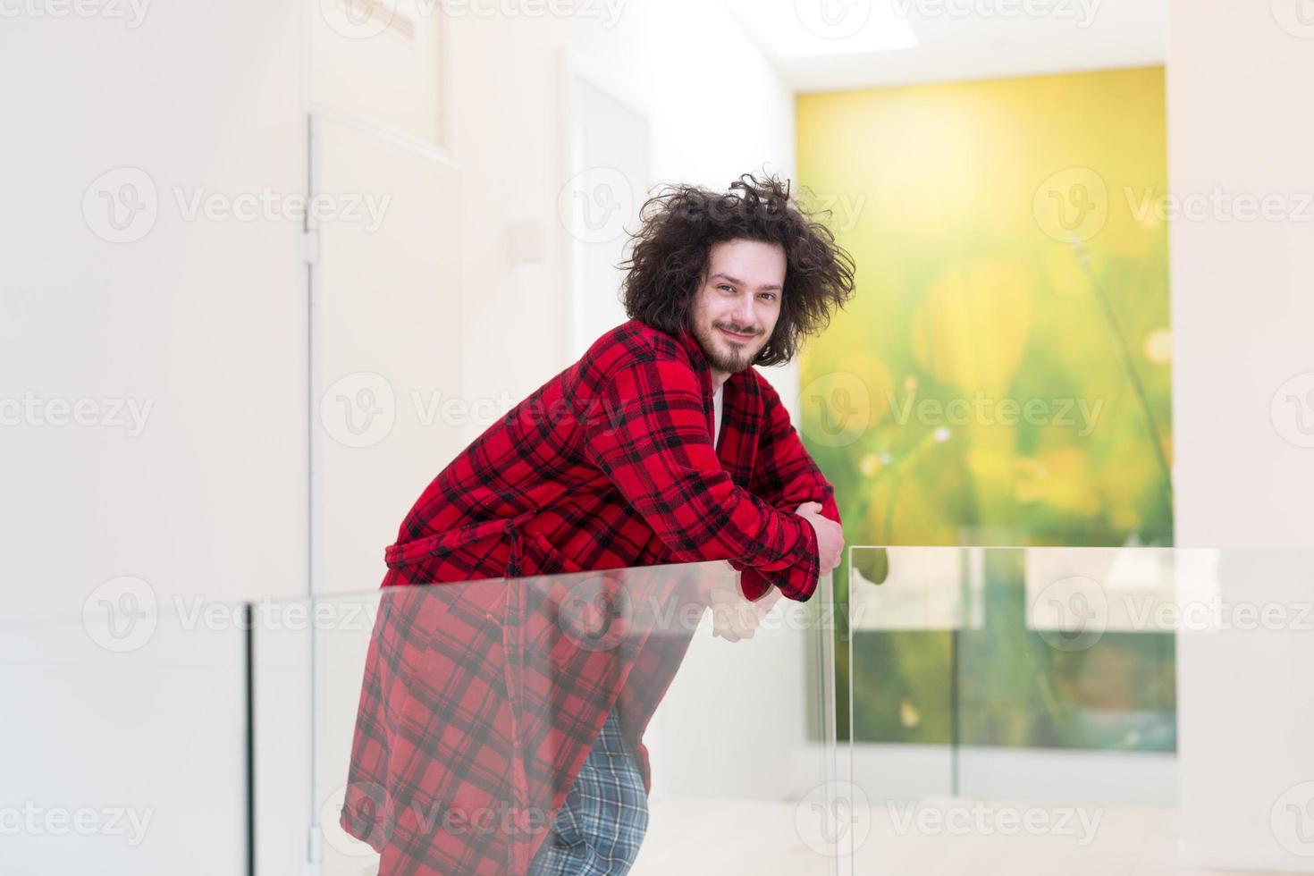 portrait of young man in bathrobe photo