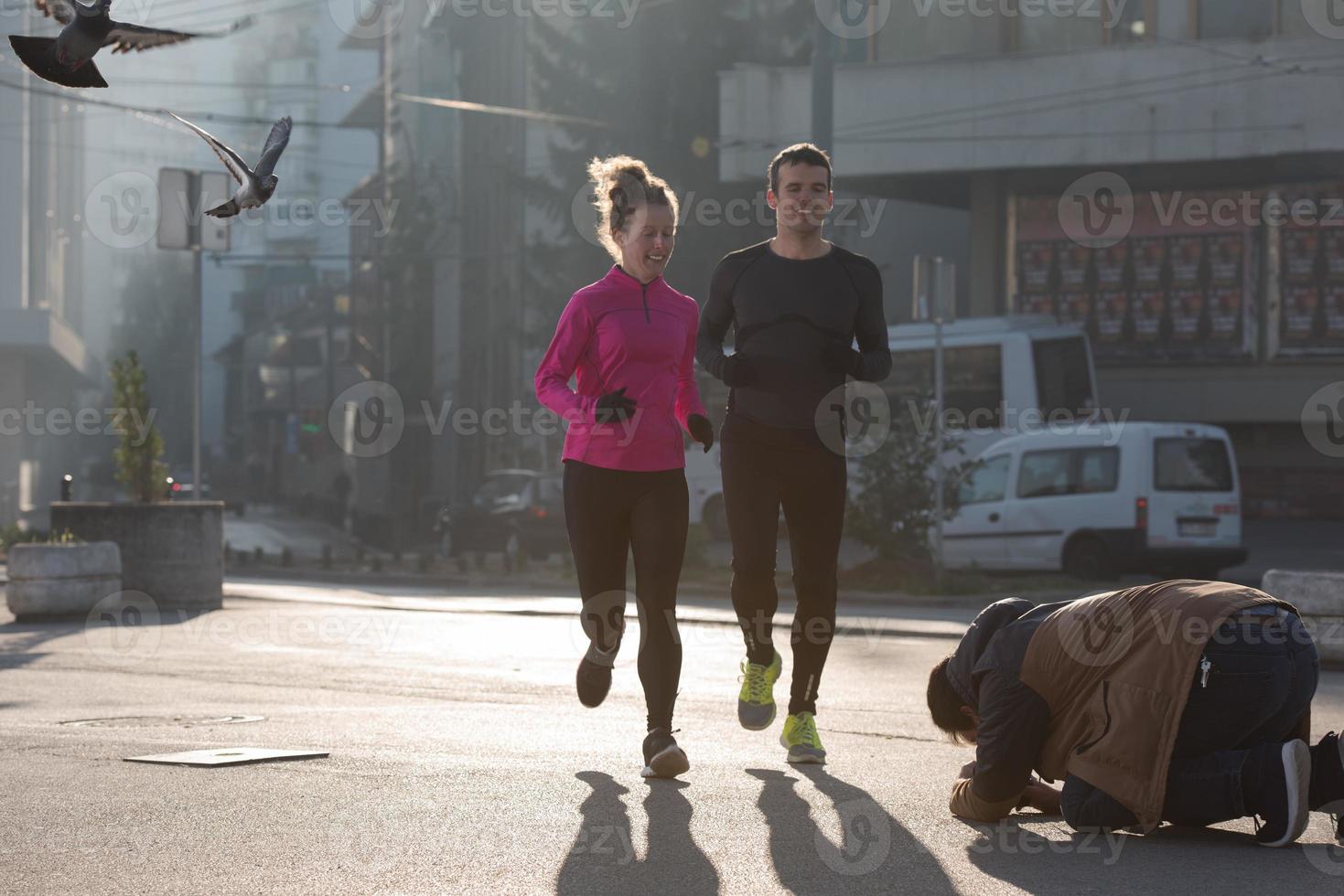 young  couple jogging photo