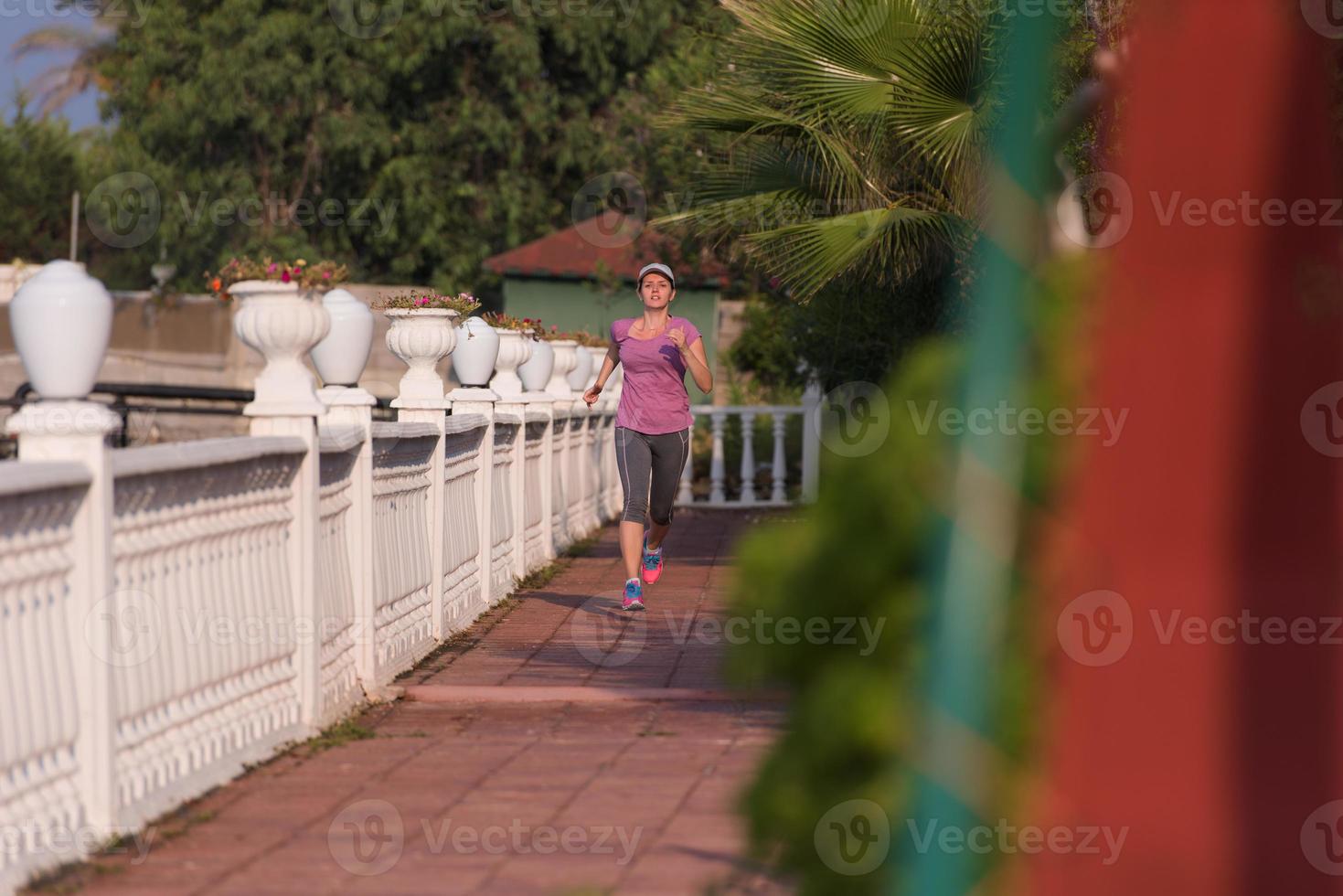 sporty woman jogging photo