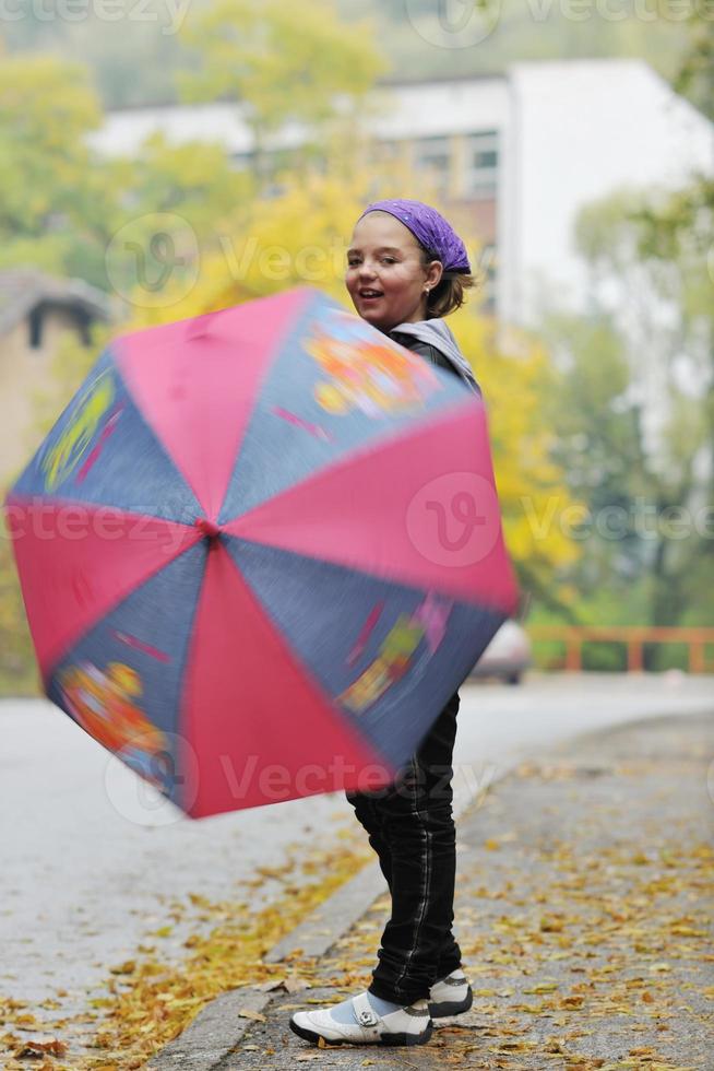 happy girl with umbrella photo