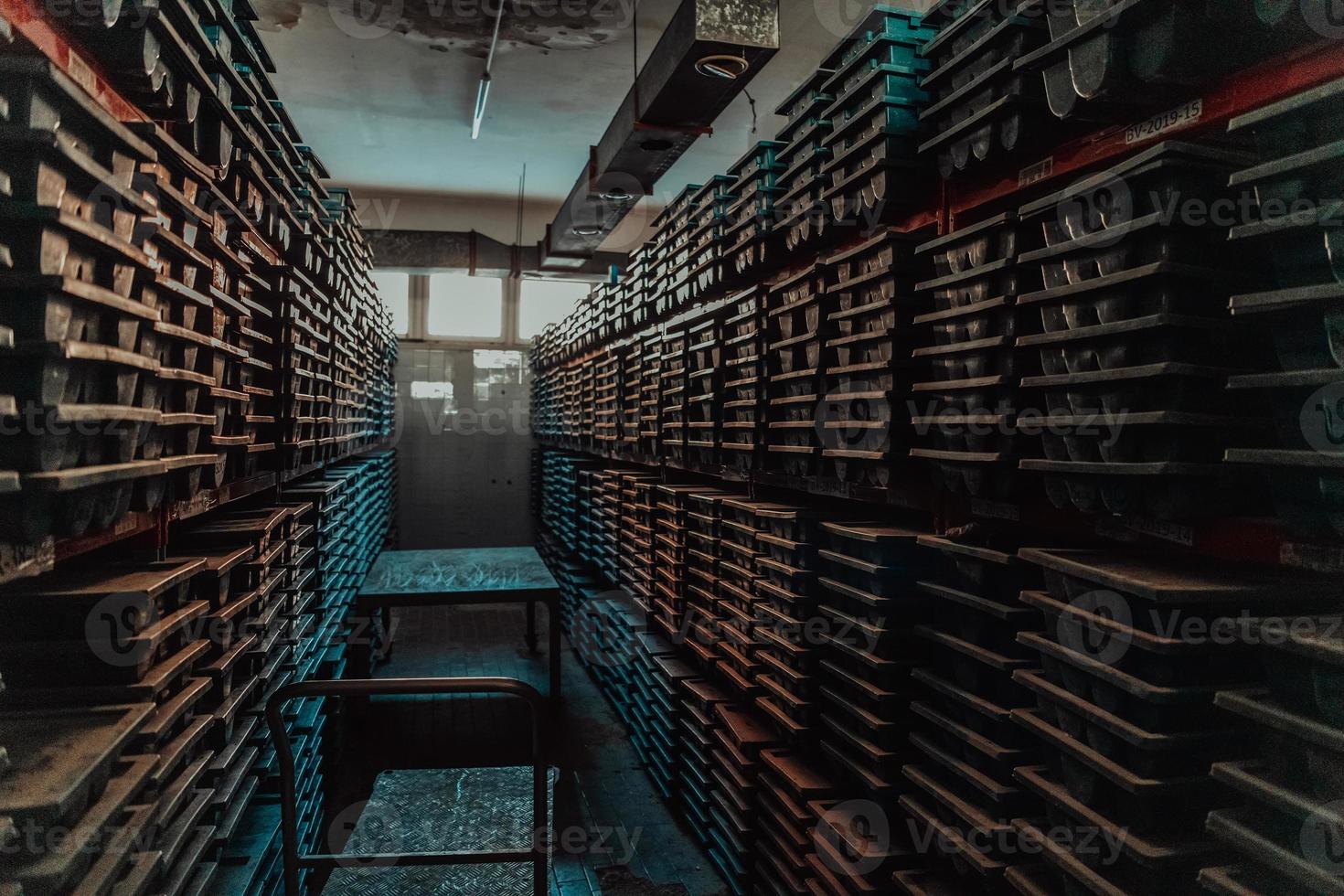 Gold mining storage rock core samples geology drilling industy. Large ore warehouse in modern industry, ores stacked in boxes. Selective focus photo