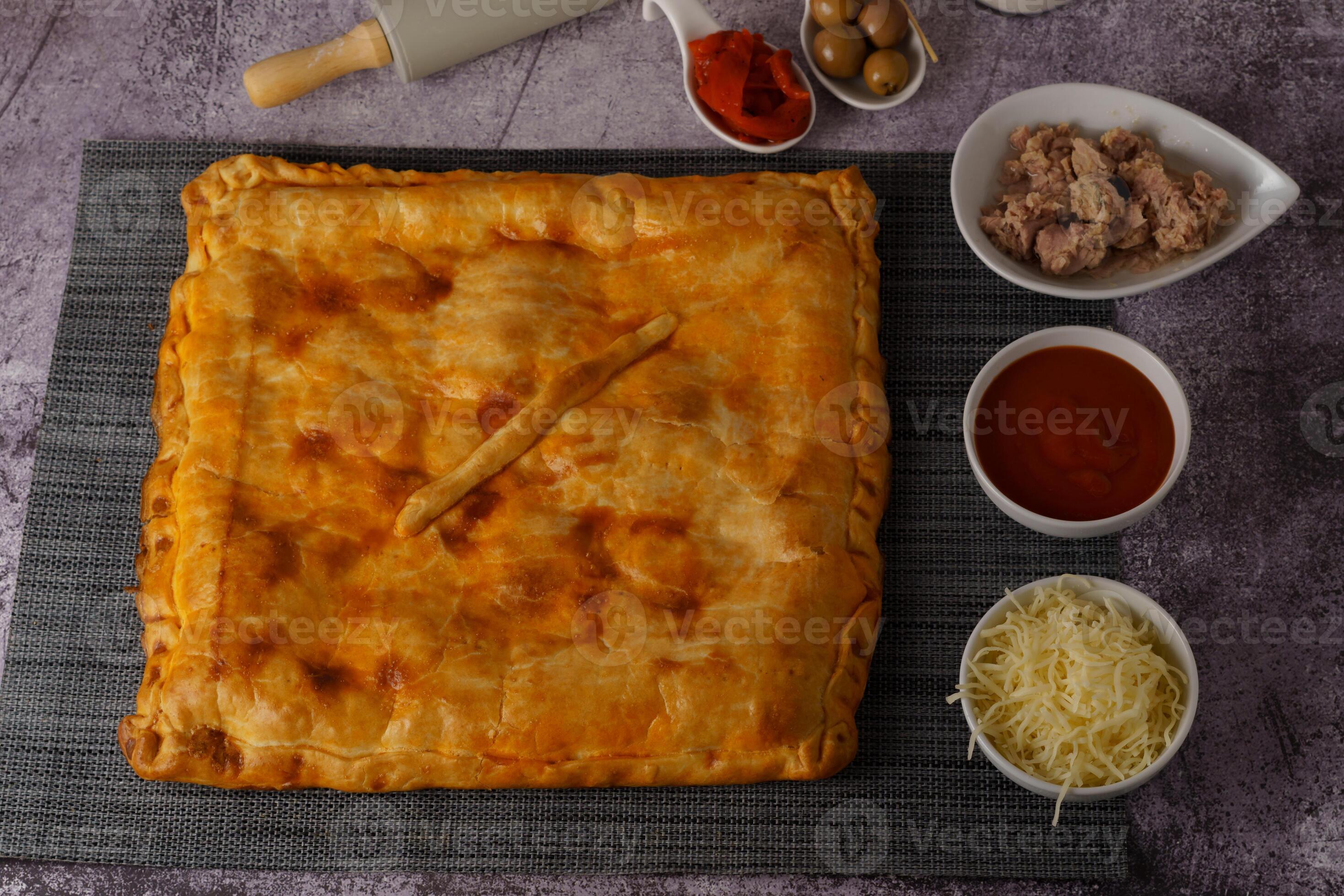 tuna empanada with all ingredients on the side 10968028 Stock Photo at