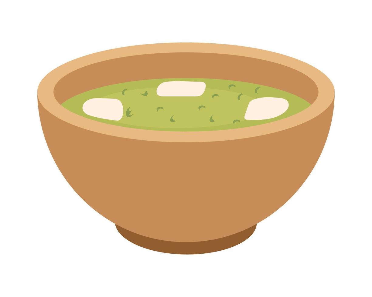 sopa verde en un tazón vector
