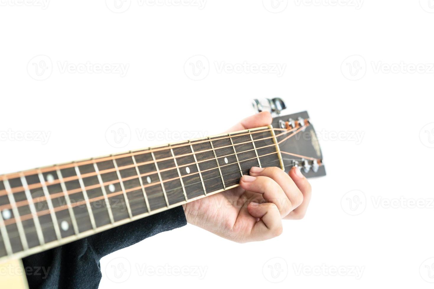 Hands playing guitar on white photo