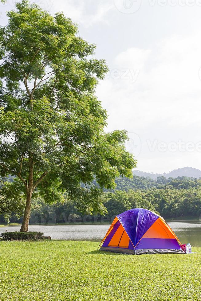 Dome tent camping at lake side photo