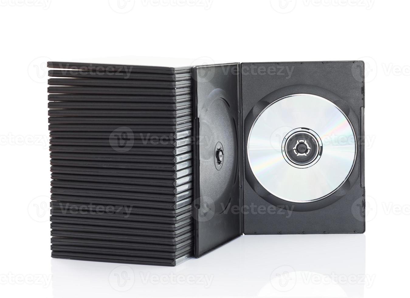 Dvd boxes with disc on white background photo
