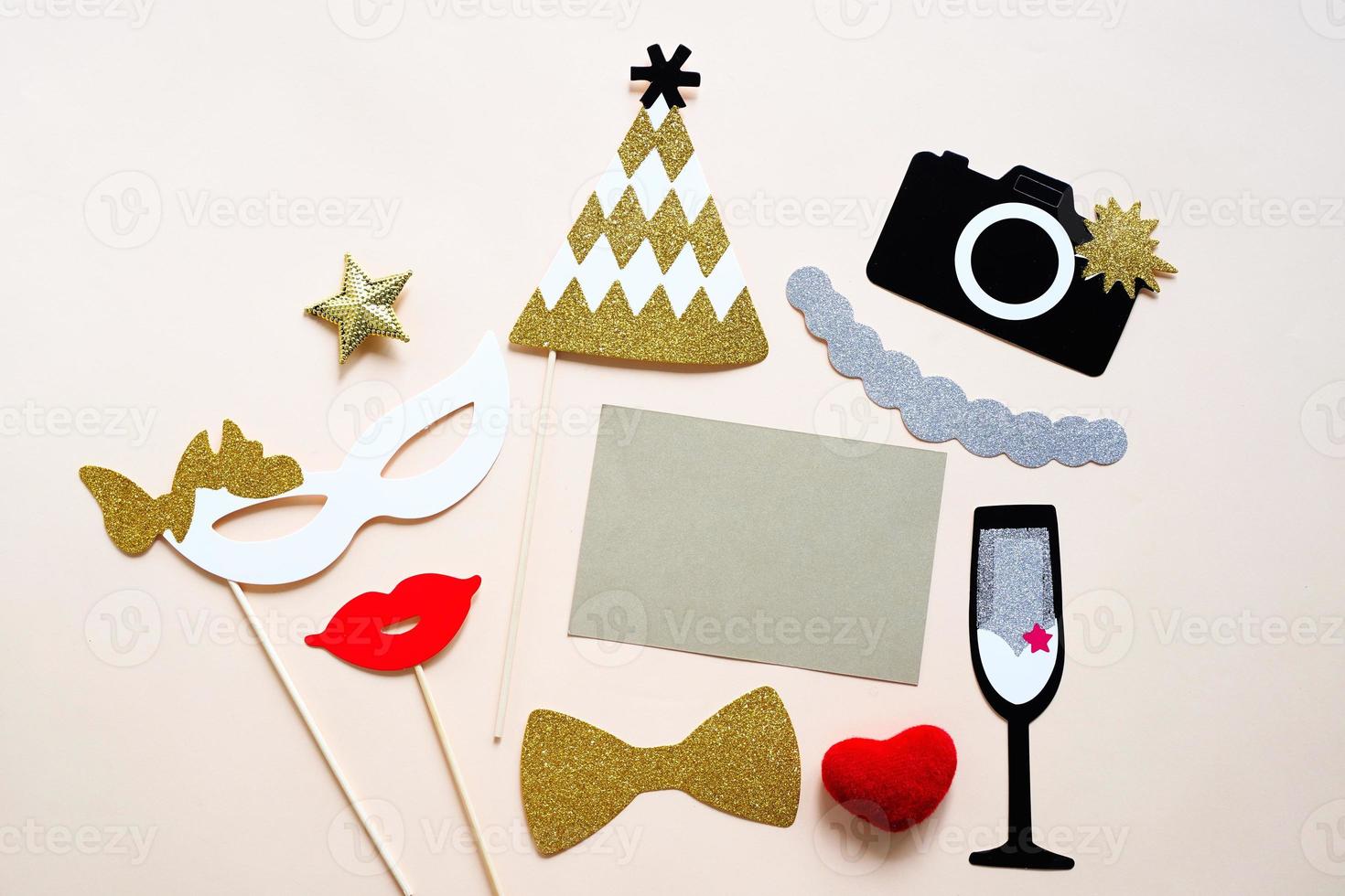 Cute party props and blank card on colorful background, happy new year party celebration and holiday concept photo