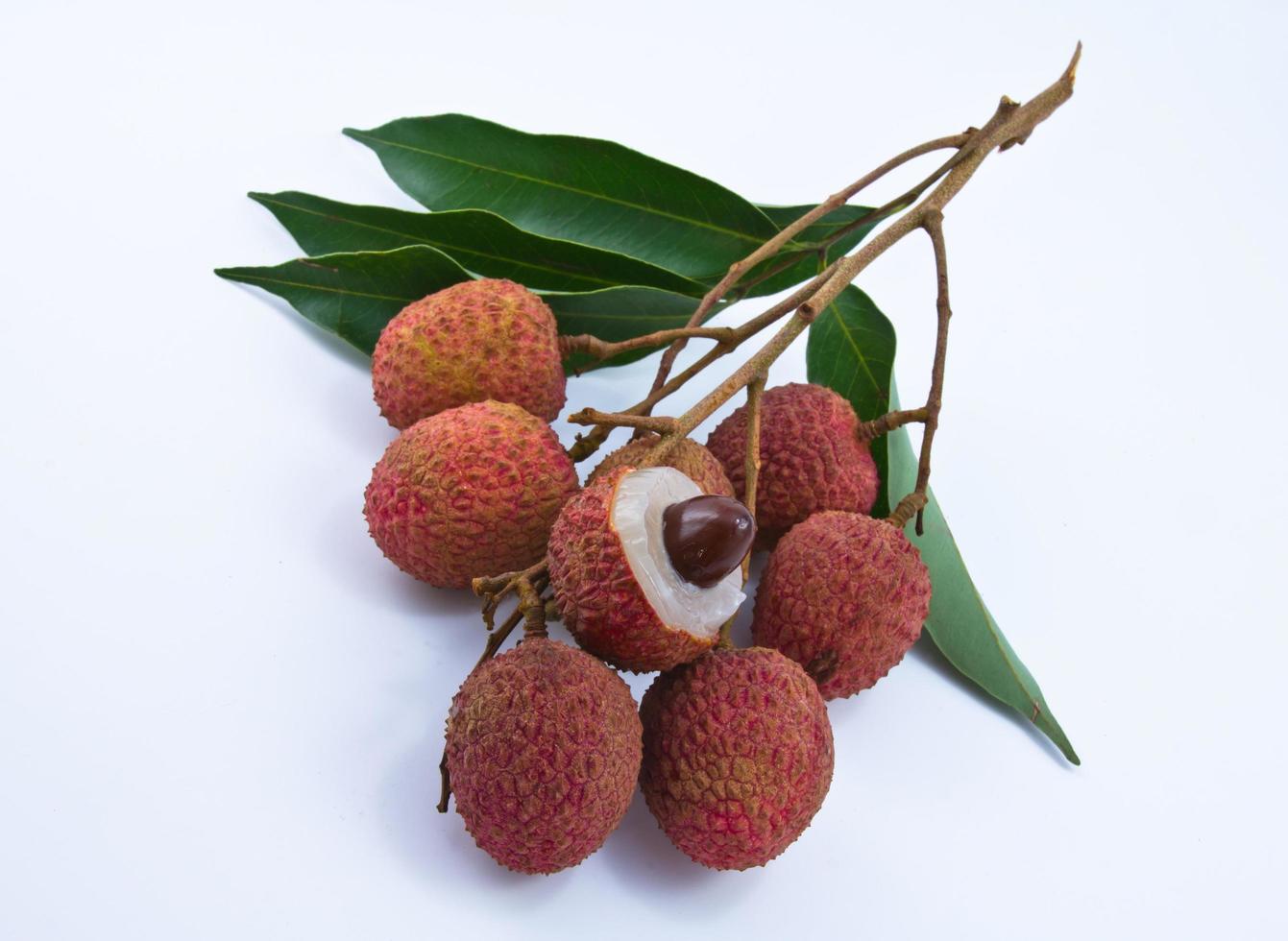 Fresh lychees isolated on white photo