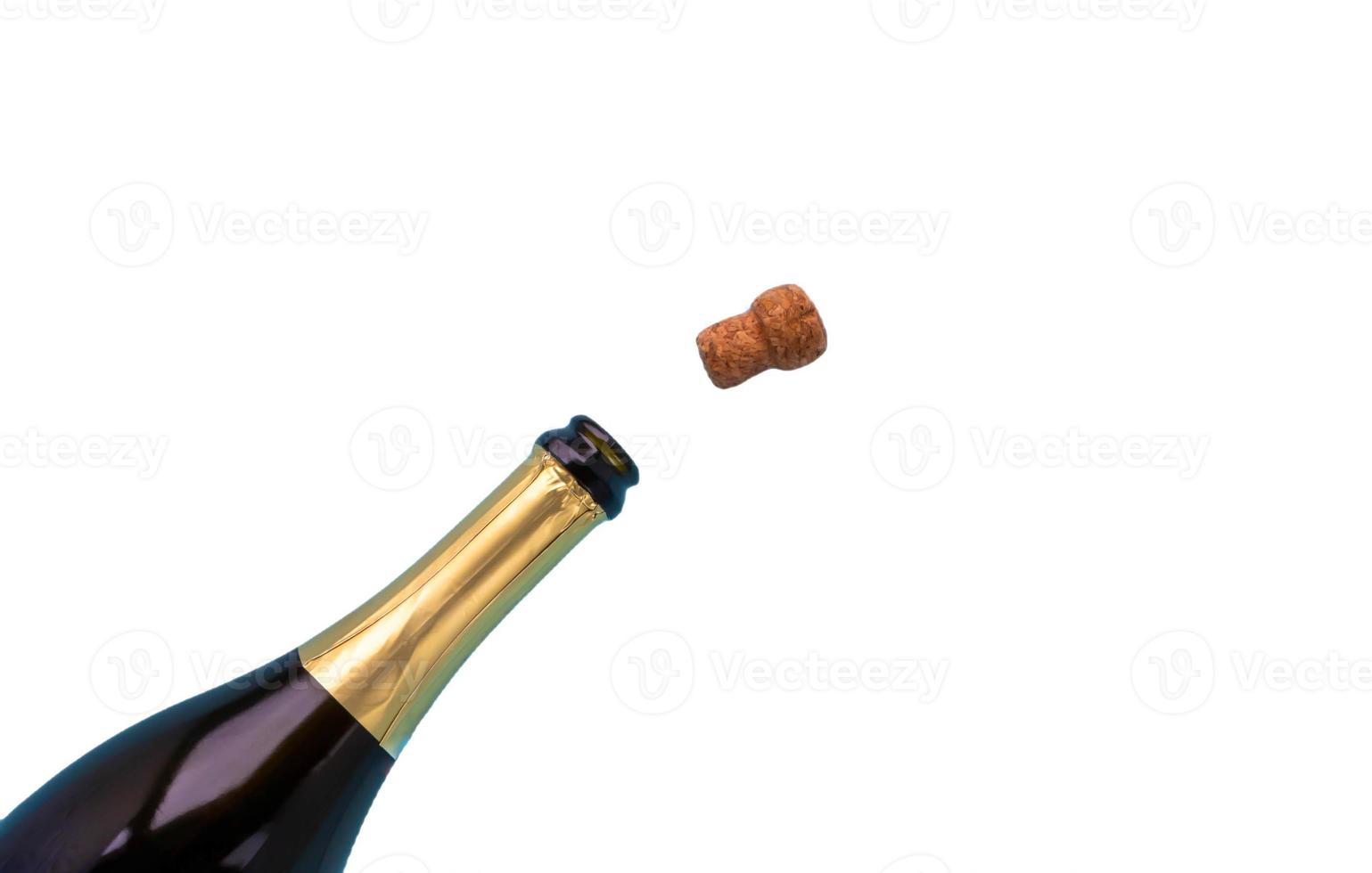 An open bottle of champagne with a cork on a white background photo