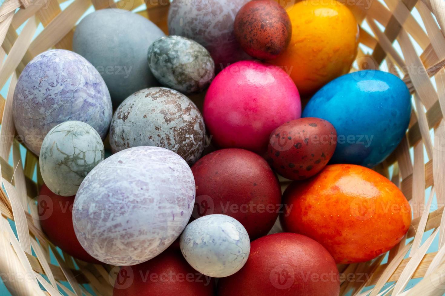 Basket with colorful Easter eggs.The Concept Of Easter photo