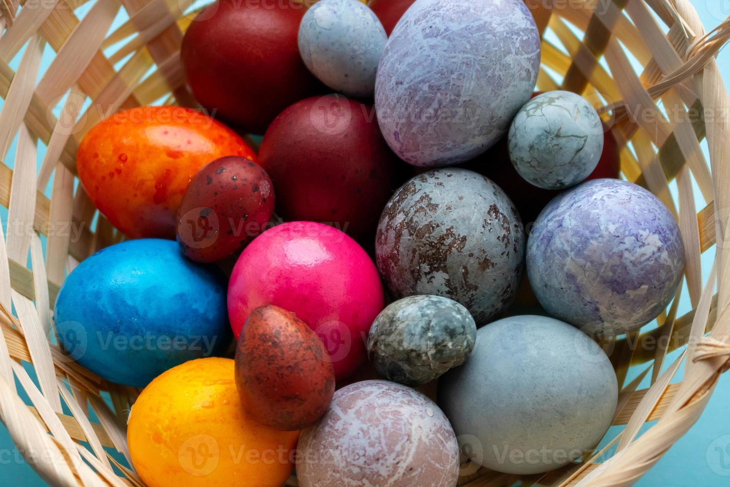 Basket with colorful Easter eggs.The Concept Of Easter photo