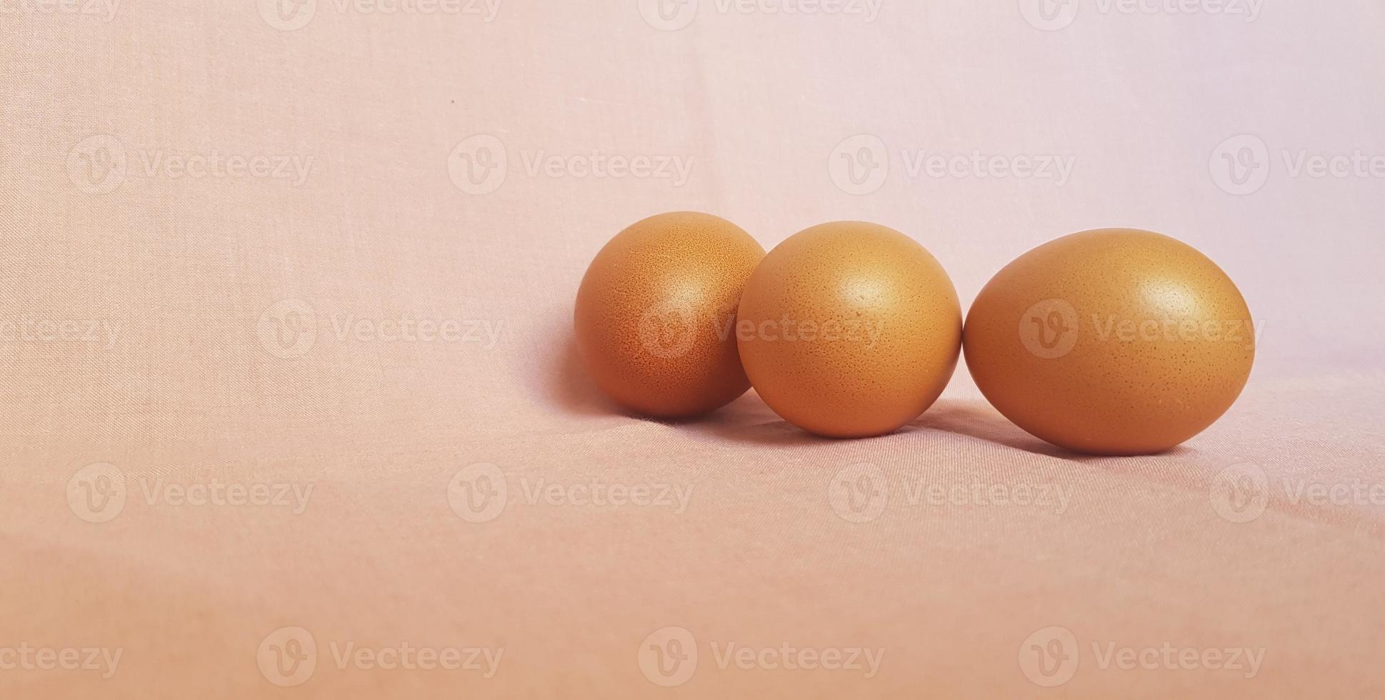 Eggs on a pink cloth. photo