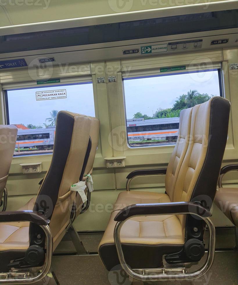 Premium economy train passenger seats in Indonesia. photo