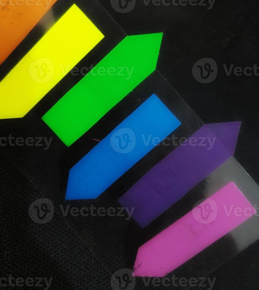 Tiny colorful sticky notes. photo
