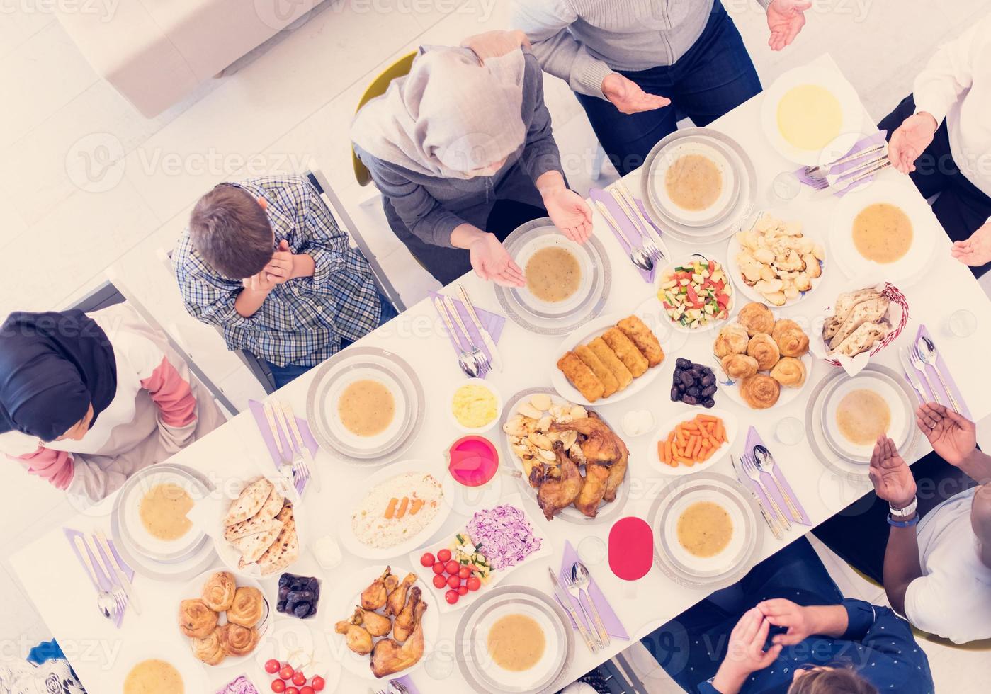 top view of modern muslim family having a Ramadan feast photo