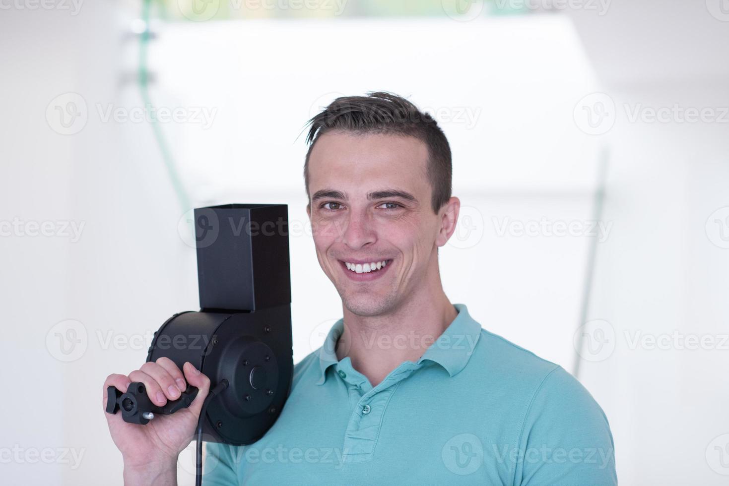 portrait of young hairstylist photo