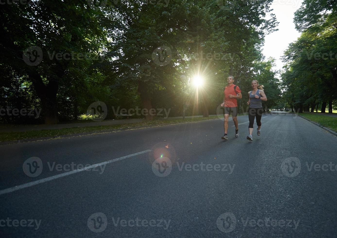 couple jogging outside photo