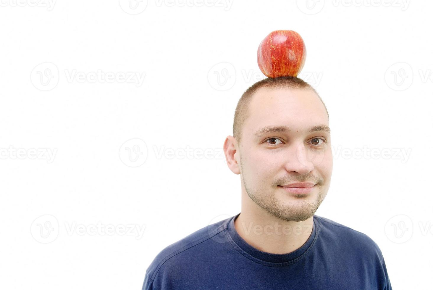 man with apple on head photo