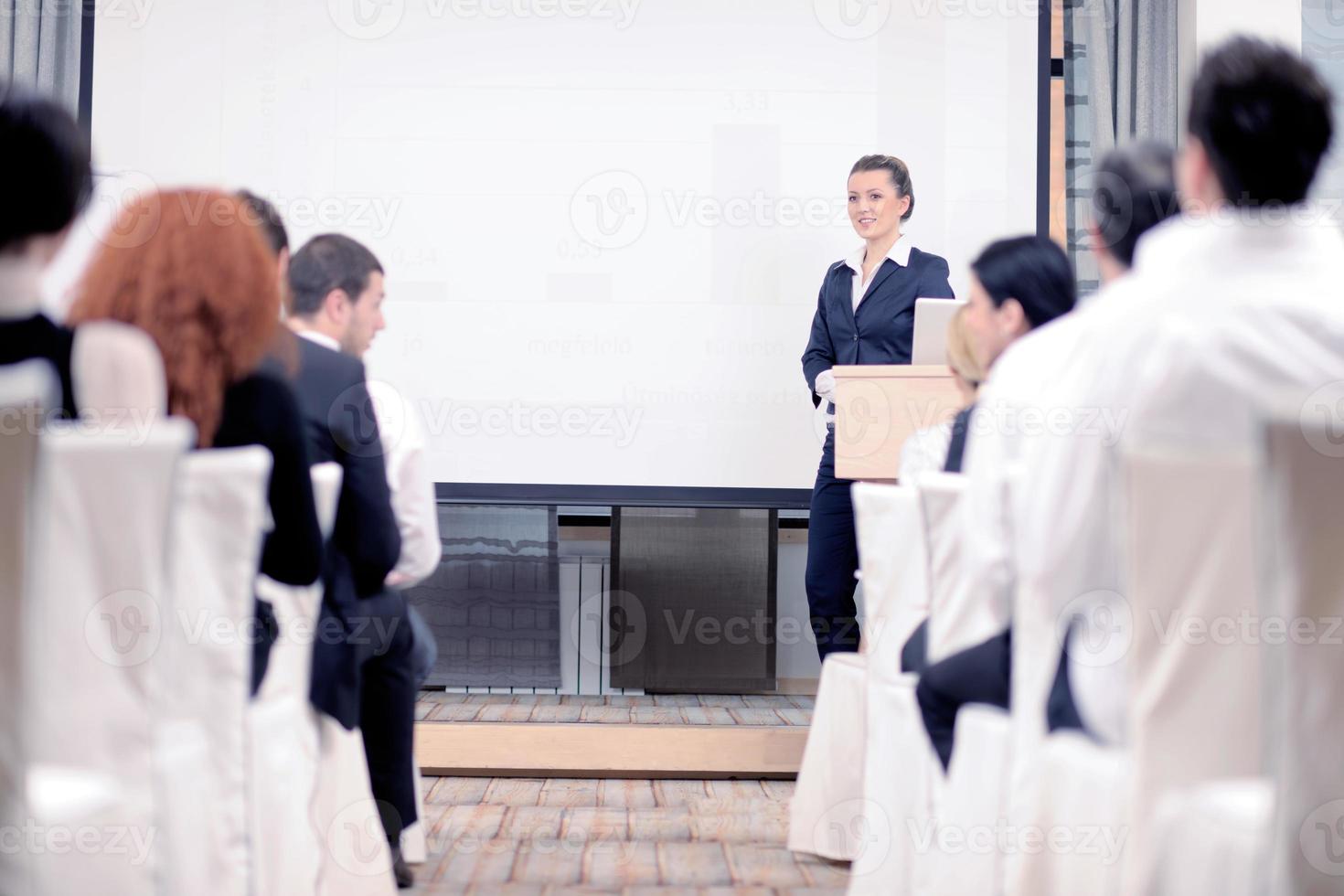 business woman giving presentation photo