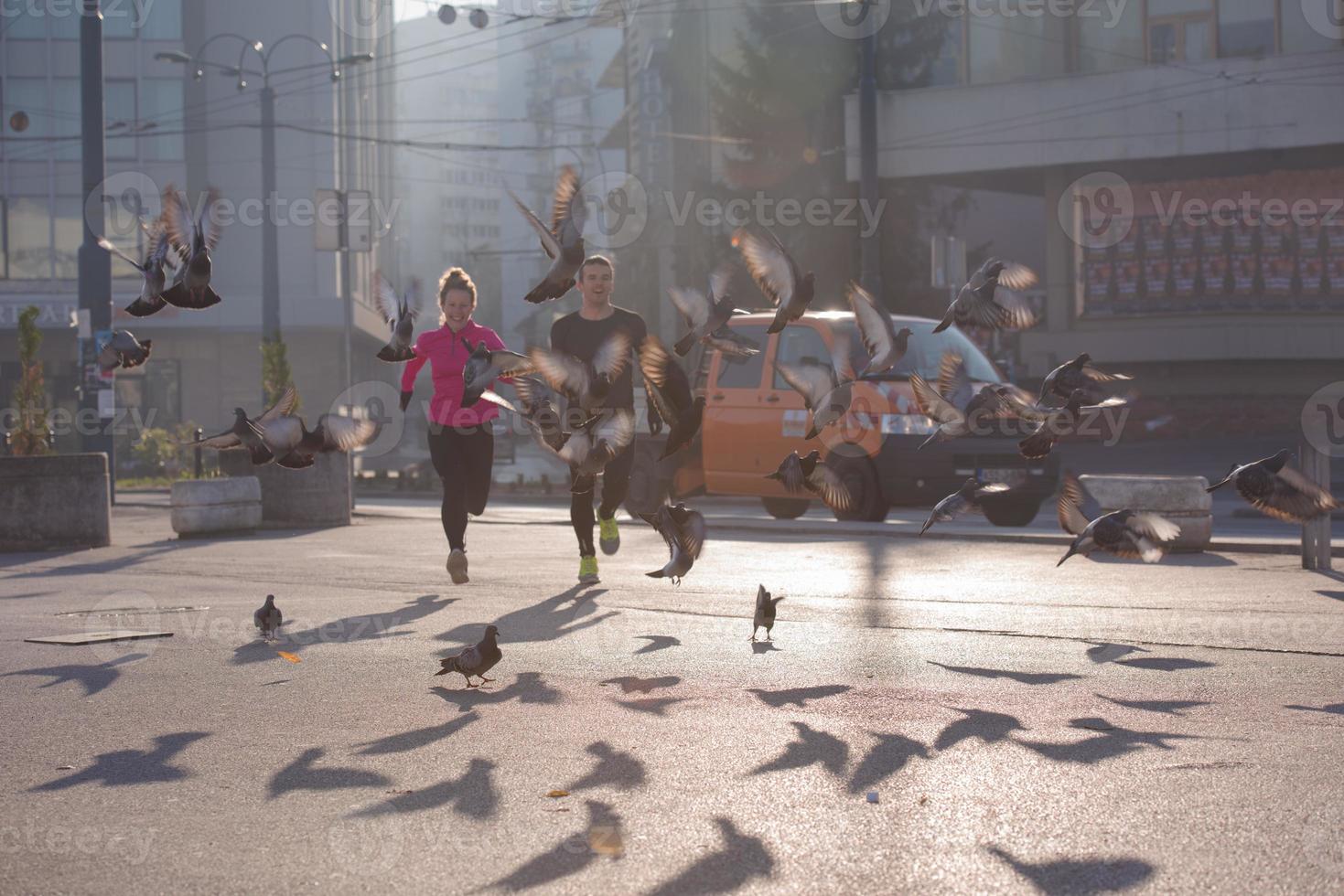 young  couple jogging photo