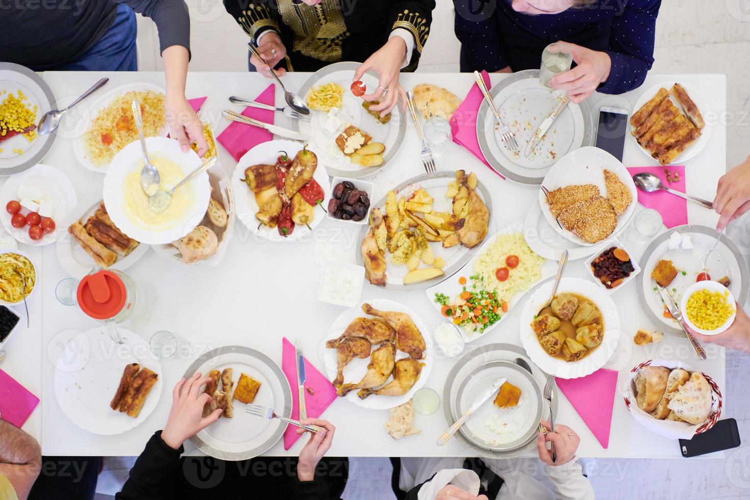 muslim family having a Ramadan feast top view photo