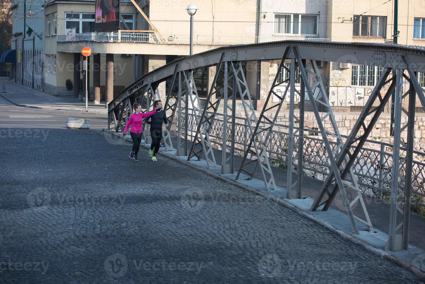 young  couple jogging photo