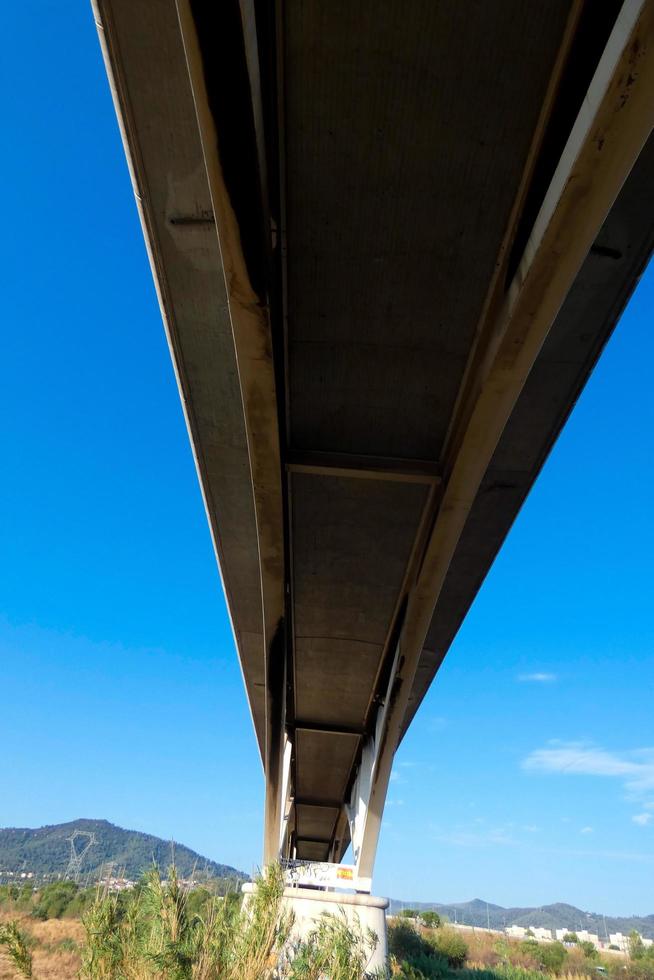 Modern river bridge, an engineering feat that thousands of vehicles pass over daily photo