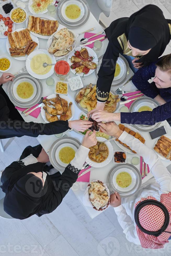 Top view of muslim family having Iftar during Ramadan holy month photo