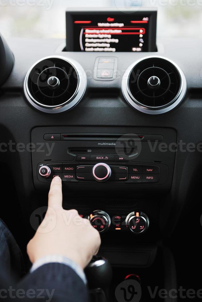 man using car navigation photo