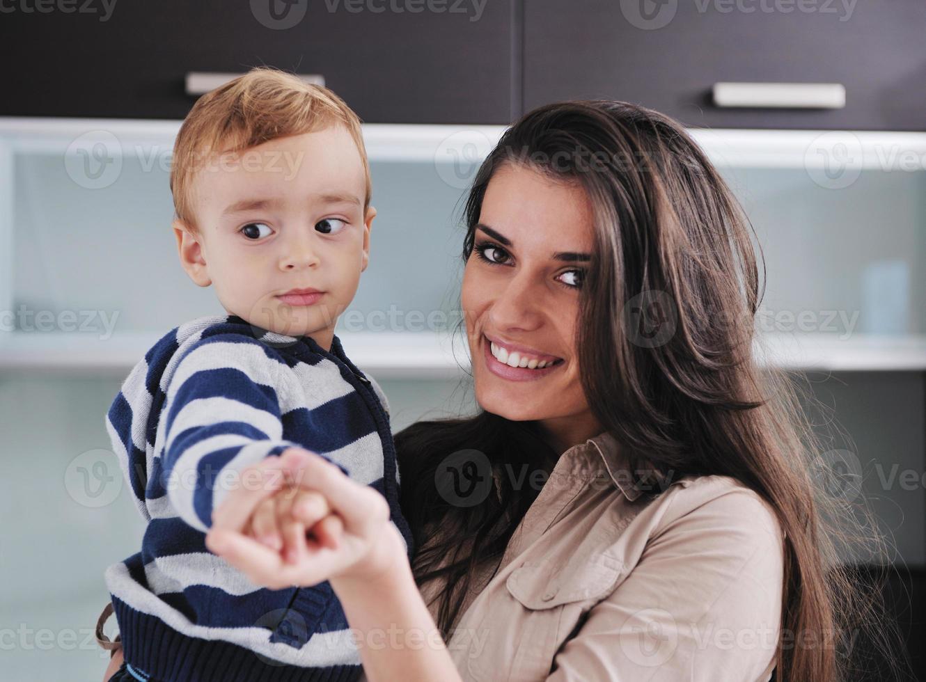 happy mom and son together at home photo