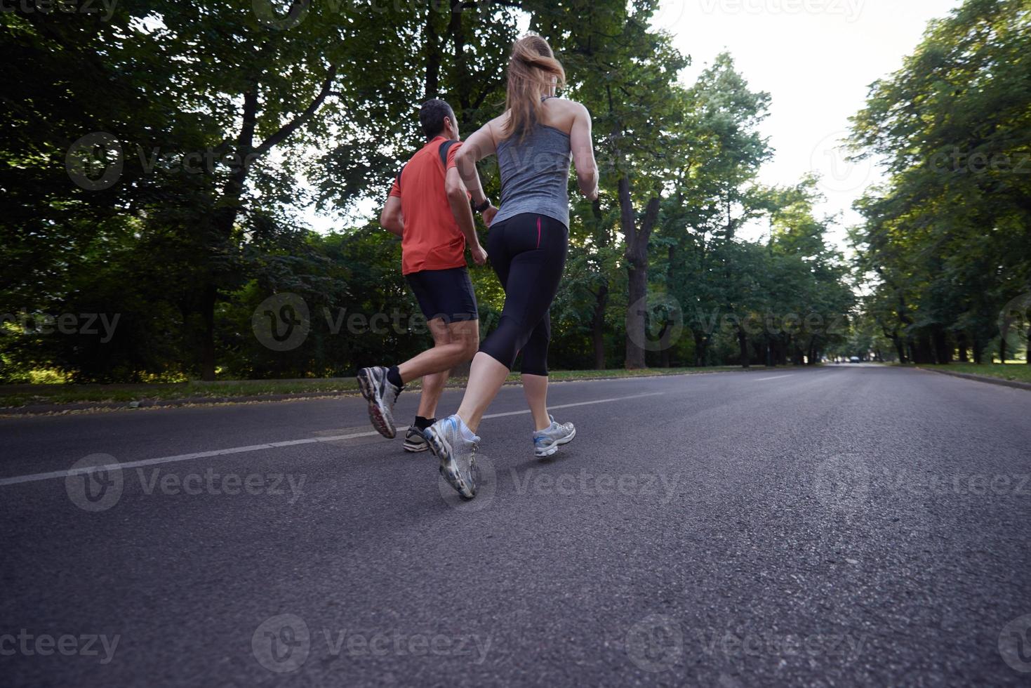 couple jogging outside photo