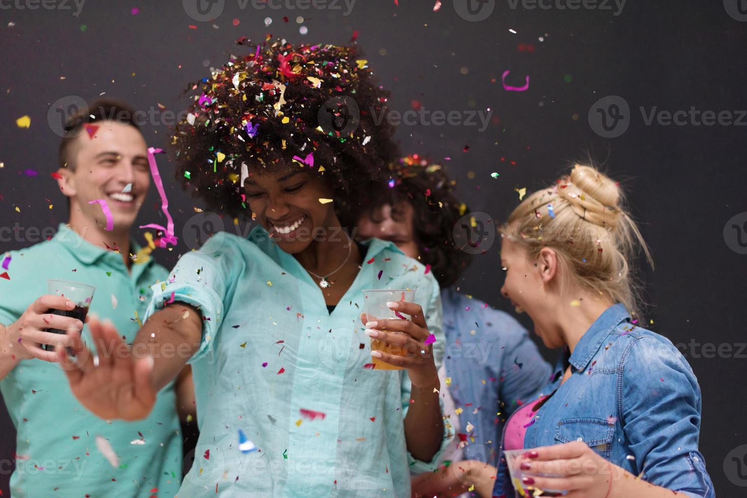 confetti party multiethnic group of people photo